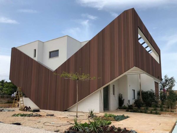 1674045384135939.jpg 木塑外墻施工.jpg